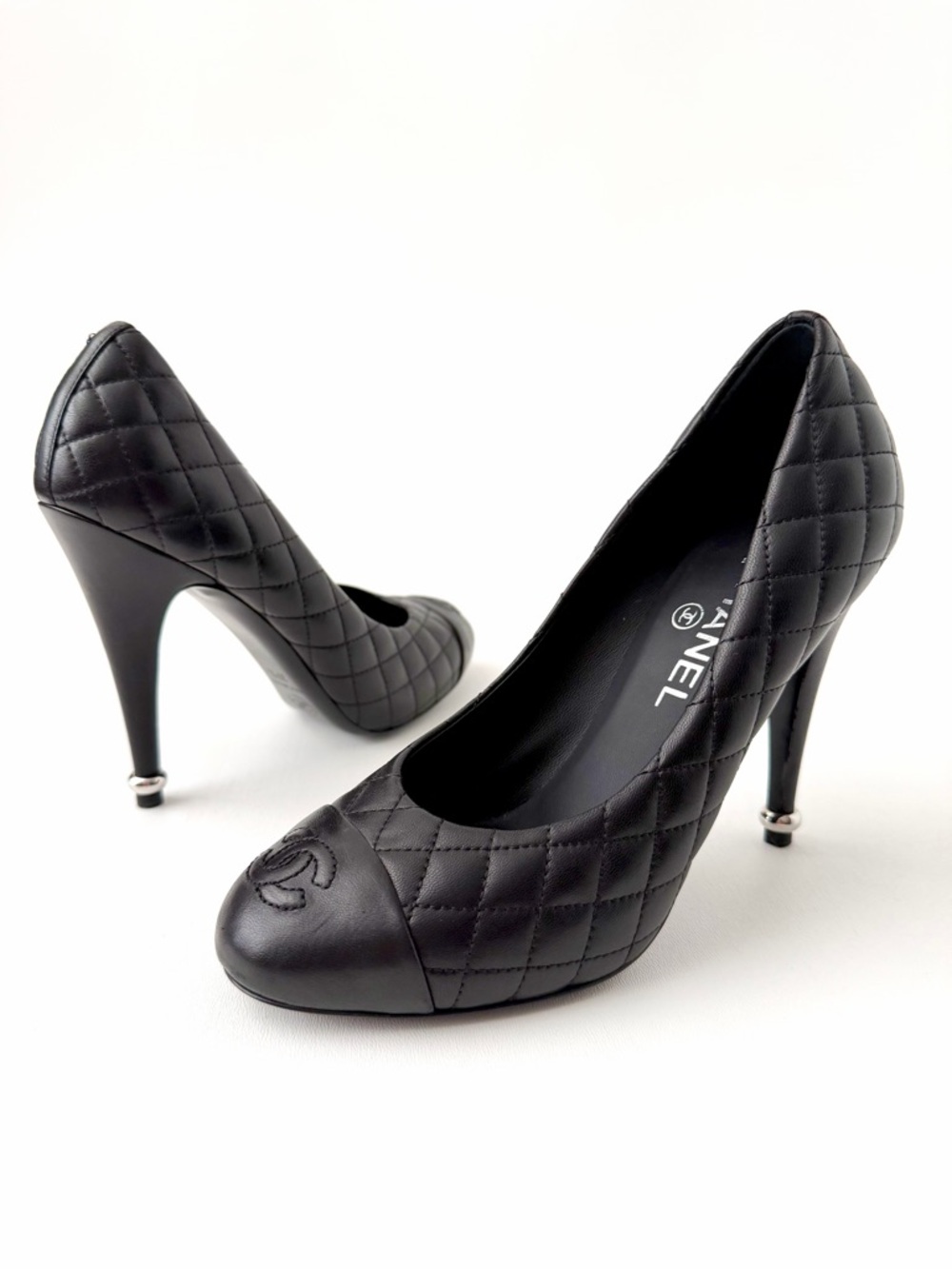 CHANEL | Black Quilted CC Cap Toe Leather High Heel Pumps EU 37.5